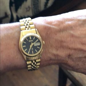 Seiko Gold Tone Watch Black Face 